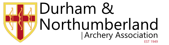 Archery targets on a field representing Durham and Northumberland Archery Association